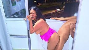 latina slut fucked on a balcony overlooking the public street in medellin, while they fuck the cars pass by on the road