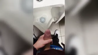 JohnHolmesJunior shoots a massive cum load in busy Vancouver public bathroom