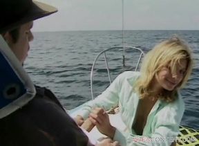 Blonde babe with an amazing body cuking a cock on a boat