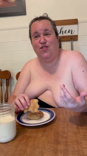 Naomi eats a cookie while topless   Clip 1