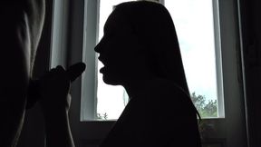 Lulu's silhouette blowjob with a cum-in-mouth finish