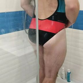 Sexy tranny wearing adidas one piece swimsuit from shiny videos