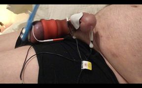 Extreme ballstretching and slapping with hard estim. Hands free orgasm