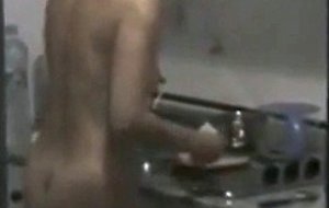 Naked in the kitchen