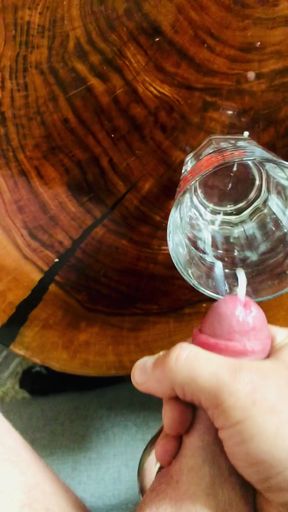 A lot of cumming in a glass of water