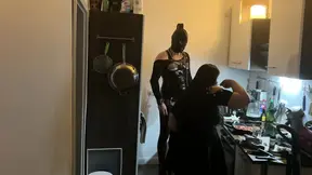 Fetish babe dominates her friend in kinky kitchen encounter