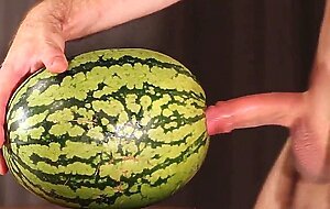Muscular Stud Fucks and Cums on Watermelon
