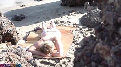 Peeping voyeur fucks blonde MILF on the beach