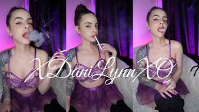Smoking Wearing Purple Lace Bra and Tutu Skirt
