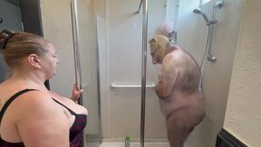 Domina Satana and Satana&#039;s piggy in the shower.