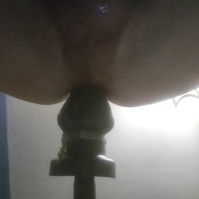 Big dildo into her ass whole