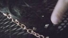 Bdsm outfit girl with a mask and collar leash