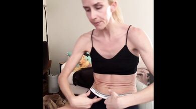 Fit blonde babe flexes abs for her fetish fans