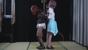 xr301-The two girls were tied tightly together.