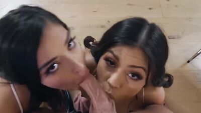 A pair of Latina office ladies are working in a team on the manager's dick