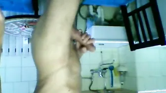 German amateur with big cock jacks off in kitchen