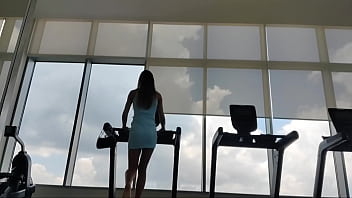 Hottie goes to the gym in a dress, gets sweaty and pees