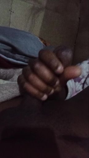 Masturbating