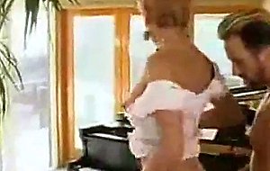 TS Blonde Satisfying A Huge Cock