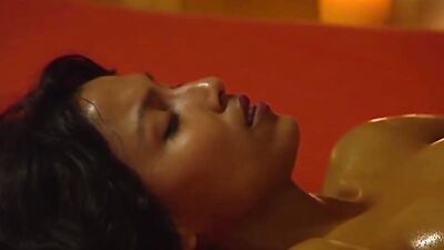 Nude and oiled up brunette gets a full body massage