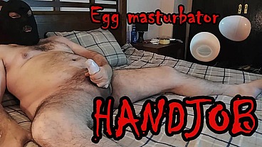 Egg masturbator handjob.