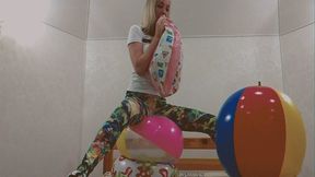 Alla inflates four rare beach balls with her mouth!!!