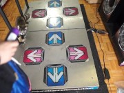 Horny nerd cums on Dance Dance Revolution Cabinet in colorful pants