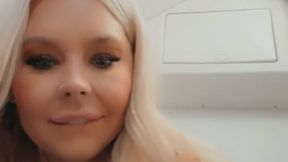 Blonde MILF gets fucked with a vodka bottle on the plane
