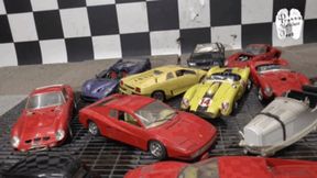 Collectible metal Cars under aggressive metal heels floor view