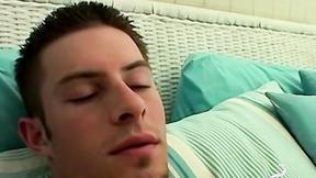 ”Mike Roberts blows a cloud of smoke while rubbing his meat”