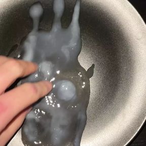 Huge cumshot on a plate with some cumplay