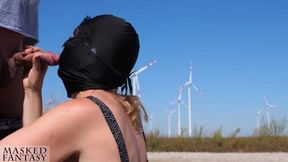 Intense outdoor blowjob in front of powerful windmills till he cums in her mouth