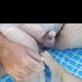 Girlfriend plays with my cock in the pool with her cute little toes and feet