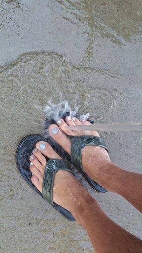 Washing my dirty feet and flip flops