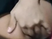 Femboy con falda juega con sus manos