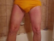 Pissing in yellow cotton briefs
