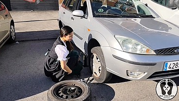 DIRNDL SLUT GETS DIRTY AND OILY CHANGING TIRES