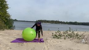 Valeri play with beachball on beach