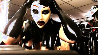 Naughty mom tries on that kinky latex costume for us