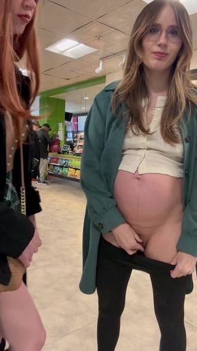 Pregnant woman in a store