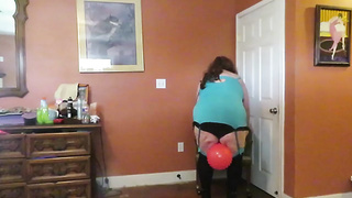 Nurse Vicki plays with a protection ball in a mini micro-skirt, spectacular stocking and high heel mini footwear
