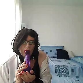 MILF tranny simulates a Blowjob by playing with a vibrator