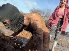 Extreme ballbusting in the mud Miss Eva Ray