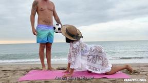 ”Satisfying latin Alika Penagos tries to do a yoga video on the beach”