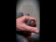 SLICK WANKING BENEATH TATTOOED SKIN, CUM DRIPS SLOW