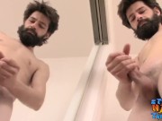 Bearded amateur playing with his cock and cumming