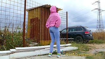 Girl with a hoodie pee trough her jeans