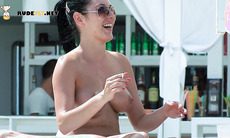 Nudist lie down sunbathing naked with their curvy asses