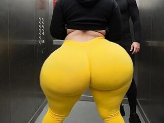Large Booty Latin babe in Constricted Yellow Leggings Dancing in the Elevator