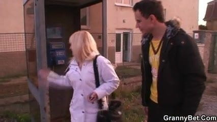 Old blonde granny pleases a stranger
